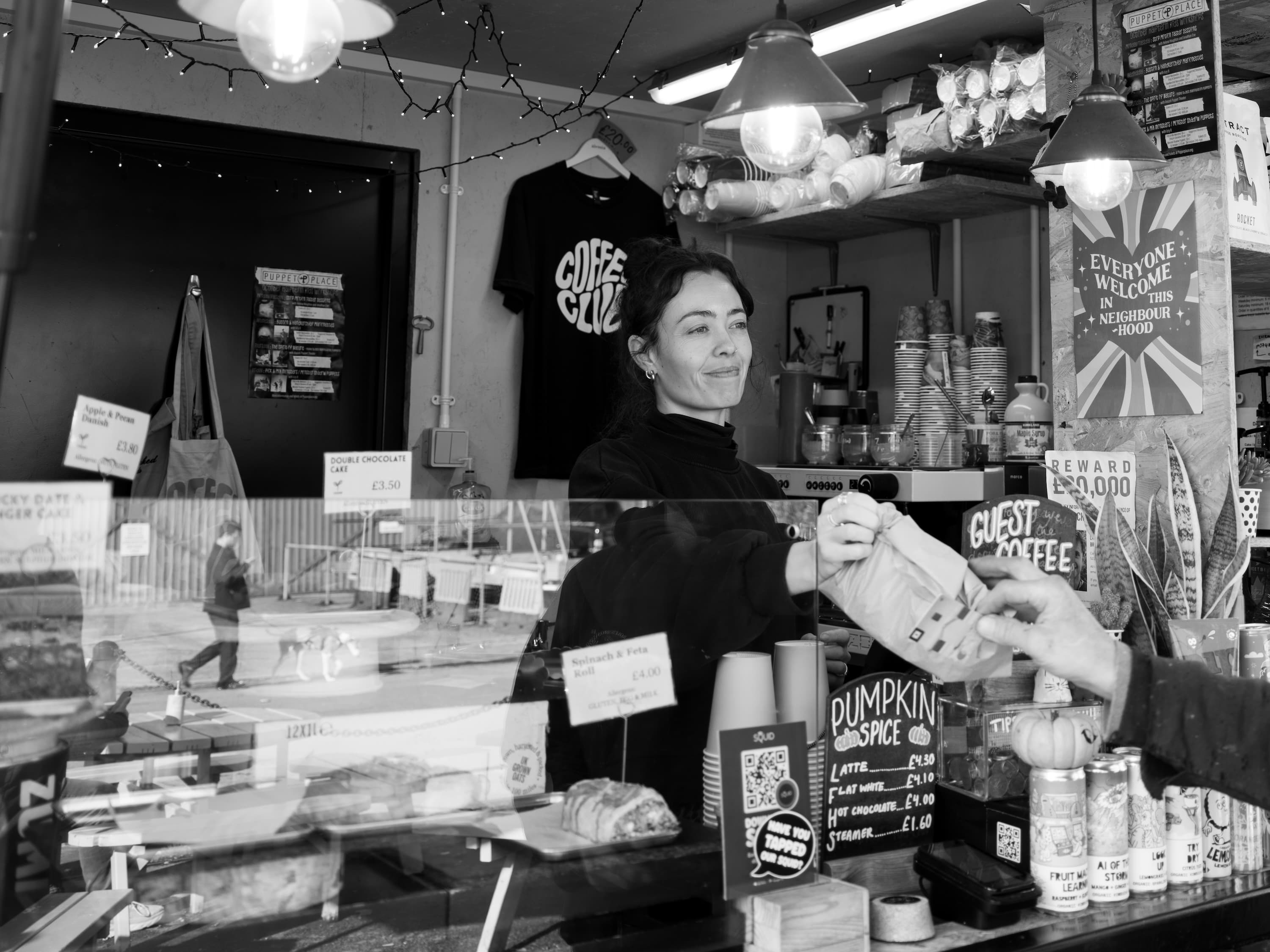 Lucy selling a pastry